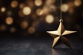 Golden Christmas Star with Bokeh Light Blurred Background