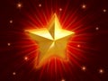 Golden Christmas star over red background radiate Royalty Free Stock Photo