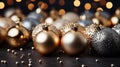 Golden Christmas tree balls on a wooden table. New Year Royalty Free Stock Photo