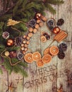 Golden Christmas Tree Decoration, Cinnamon Sticks, Dried Oranges, Baubles. Royalty Free Stock Photo