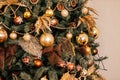 Golden Christmas tree look, decor in country style as holiday home decoration Royalty Free Stock Photo