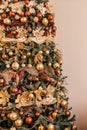 Golden Christmas tree look, decor in country style as holiday home decoration Royalty Free Stock Photo