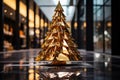 a golden christmas tree sits in the middle of a lobby Royalty Free Stock Photo