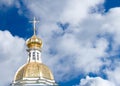 Golden church dome on cloudy sky background Royalty Free Stock Photo