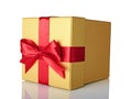 Golden classic shiny gift box with red satin bow Royalty Free Stock Photo