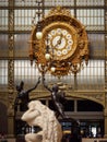 Golden clock by Victor Laloux at the Musee d`Orsay, Paris, France Royalty Free Stock Photo