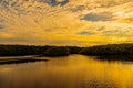 Golden Clouds Reflecting in the Loxahatchee River