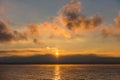 Golden Sunrise behind Alps Mountains and over Lake Leman Royalty Free Stock Photo