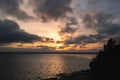 A golden cloudy sunset over the rippling water in Pegwell Bay, Ramsgate Royalty Free Stock Photo