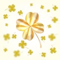 Golden clover leaf isolated on light background. St. Patricks day abstract design with flying bright and blurry gold shamrock Royalty Free Stock Photo