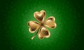 Golden clover leaf, vector illustration for St. Patrick day. Isolated four-leaf on green floral background. Jewelry 3d design Royalty Free Stock Photo