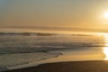 Golden coastal sunrise on surf beach Papamoa, Tauranga