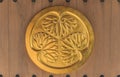Golden coat of arms of the Shogun clan Tokugawa of ancient capital Edo which symbolizes three leaves of hollyhocks