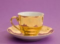 Golden coffee cup