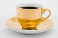 Golden coffee cup