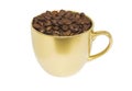 Golden coffee cup with coffee beans Royalty Free Stock Photo