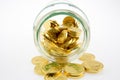 Golden coins in a jar Royalty Free Stock Photo