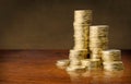 Golden coins stacks on table background Royalty Free Stock Photo