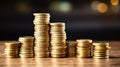 Golden coins stacks on wooden table with bokeh background, business and finance concept idea. Generative AI Royalty Free Stock Photo