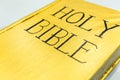 Golden color holy bible cover closeup detail view Royalty Free Stock Photo