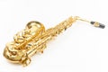 Golden color Saxophone isolated above white background Royalty Free Stock Photo