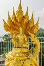 Golden color statue of Buddha and dragons in the temple in Phuket. Thailand