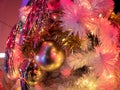 The golden color on the white christmas tree decoration with the Royalty Free Stock Photo