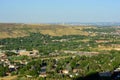 Golden, Colorado on a sunny day with the Denver skyline in the background