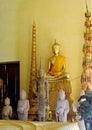 Golden-colored buddha statue inside the temple Royalty Free Stock Photo