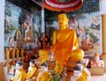 Golden-colored buddha statue inside the temple Royalty Free Stock Photo