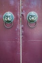 Golden colored chinese door knockers Royalty Free Stock Photo