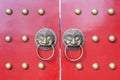 Golden colored chinese door knockers Royalty Free Stock Photo