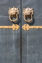 Golden colored chinese door knockers Royalty Free Stock Photo