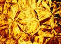 Golden colored relief crystal fire backgrounds Royalty Free Stock Photo