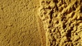 Golden colored rough surface closeup