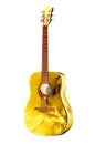 Golden colored shiny acoustic guitar with red strings, mahagony fretboard and picks isolated on the white background