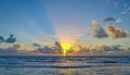 Golden colorful sunrise sunset with sunbeams tropical beach Tulum Mexico Royalty Free Stock Photo