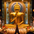 A golden colour Buddha statue in temple.