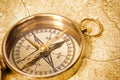 Golden compass on old map Royalty Free Stock Photo