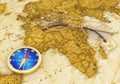 golden compass on the old map with glasses Royalty Free Stock Photo