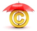 Golden copyright symbol covered by red umbrella