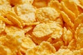 Golden cornflakes background and texture. View from above. cornflakes healthy breakfast. Close-up. macro Royalty Free Stock Photo