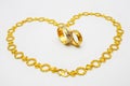 Golden Couple Ring and Necklace Royalty Free Stock Photo