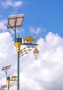 golden cow light bulb and solar energy with blue sky background Royalty Free Stock Photo