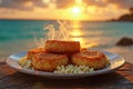 Golden crabcakes with corn on a beachfront at sunset Royalty Free Stock Photo