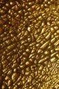 Golden cracked psycho paint on canvas macro modern background high quality big size instant prints dried painting art abstracts Royalty Free Stock Photo