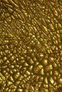 Golden cracked psycho paint on canvas macro modern background high quality big size instant prints dried painting art abstracts Royalty Free Stock Photo