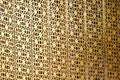 The Golden craft Thai pattern popup on the wall backdrop in some place at Thailand Royalty Free Stock Photo