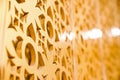 The Golden craft Thai pattern popup on the wall backdrop in some place at Thailand Royalty Free Stock Photo