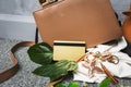 Golden credit card over brown bag woman accessories for go to sh